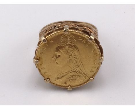 An 1887 shield back half sovereign ring. 8.03g and size O