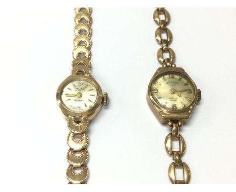A 9ct vintage ladies Avia wrist watch 11.69g and a 9ct metal core ladies rotary watch 12g. Postage B
