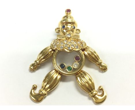 An 18ct gold diamond and multi stone clown pendant , 10.8g. Postage category A