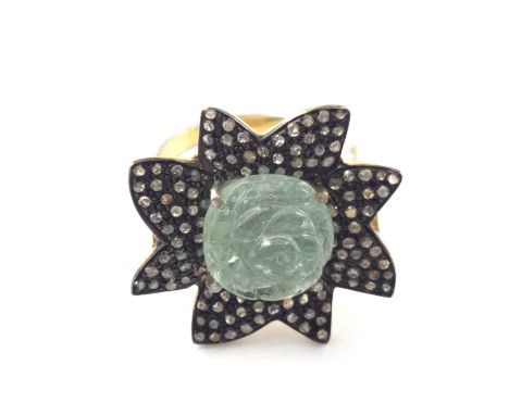 Flower shaped gold and silver ring set with carved aquamarine and rose cut diamonds. Aquamarine 3.90ct and 0.88ct diamonds. S