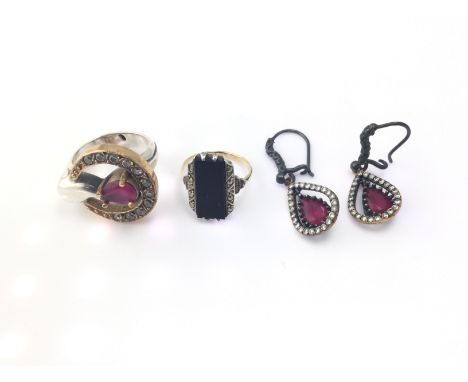A silver and gilt ring and a 9ct and silver ring and a pair of earrings. Postage B