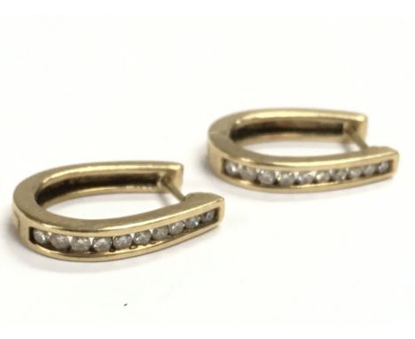 A pair of 9ct gold diamond loop earrings , 5g total weight. Postage category A