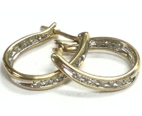 A 9ct gold diamond hoop earrings , 2.3G total weight. Postage category A