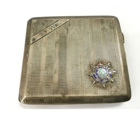 A silver hallmarked cigarette case with enamel Royal Army Service Corps badge applied to the front of the case. Postage categ