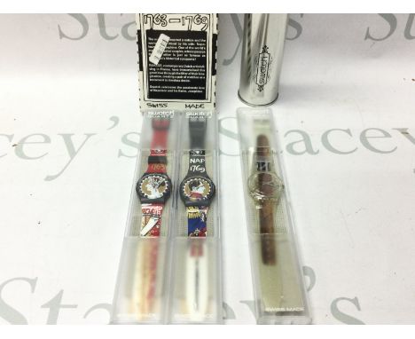 A Napoleon and Josephine pair of swatch watches and a swatch cigar watch.