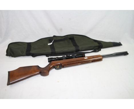 A Weihrauch HW 97 K .22 Cal Air Rifle With Simmons Scope.