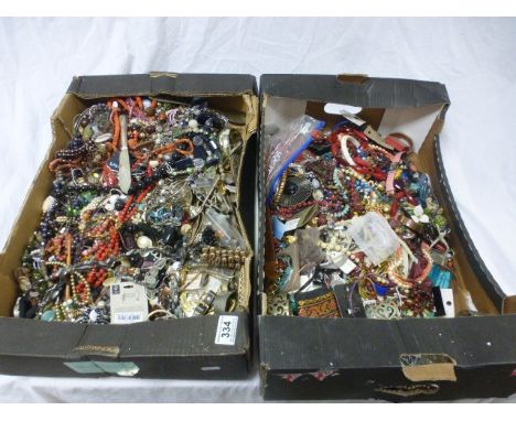 Two large boxes of costume jewellery include necklaces, bangles, watches, napkin ring, egg cup etc