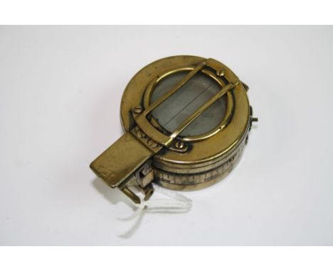 A World War Two / WW2 British Army Compass By T.G. Co Ltd Dated 1940 And Stamped With The Broad Arrow.