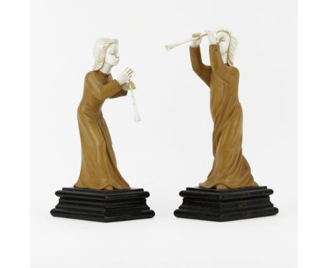 In the manner of Simon Troger, Austrian (1683-1768) Carved Wood and Ivory Musicians. Good condition. Measures 11" H x 3-3/4" 