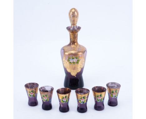 Seven (7) Piece Italian Amethyst and Gilt Art Glass Decanter and Cordials Set. Rubbing to gilt and paint. Decanter measures 1