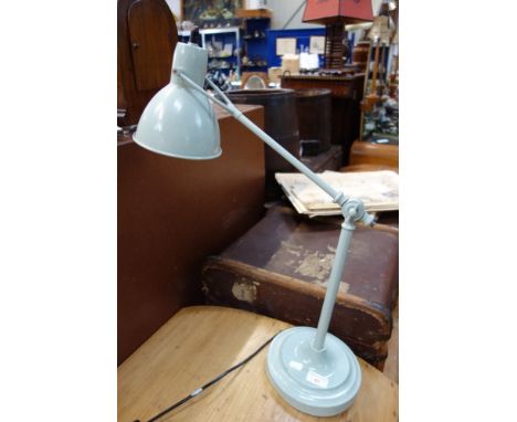 A BLUE PAINTED ADJUSTABLE DESK LAMP