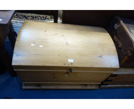 A VICTORIAN STRIPPED PINE TRUNK of domed sarcophagus form with drawer below, 85cm wide