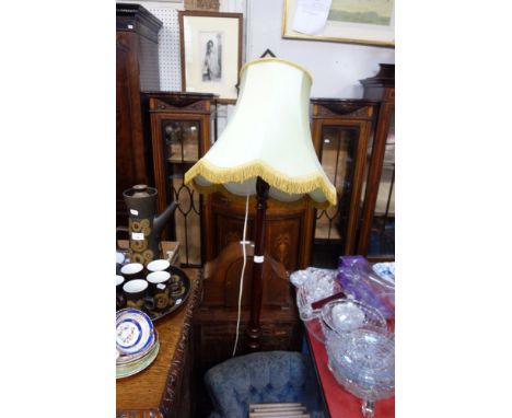 A VICTORIAN EBONISED TUB CHAIR, an oak drop flap occasional table, a gilt framed mirror and a standard lamp