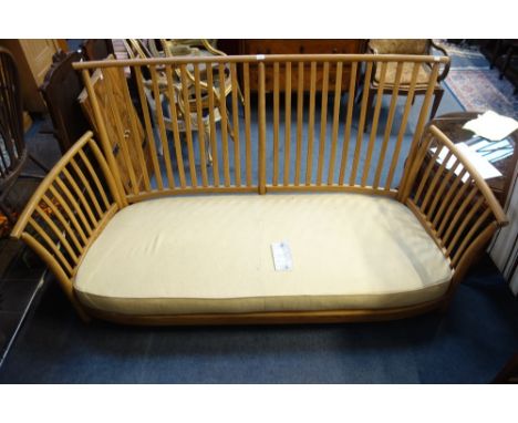 ERCOL: A "Renaissance" two seater sofa frame and base in golden ash (no cushions), 190cm wide