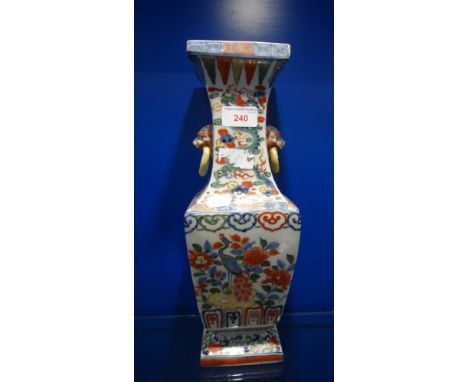 A CHINESE VASE of square form, with animal mask and ring handles, 35.5cm high