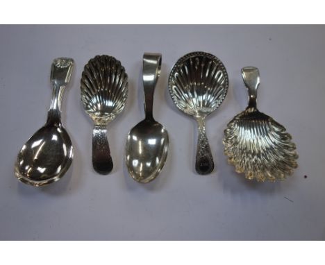 A GEORGE III SILVER CADDY SPOON, by William Bateman, London, 1809, three other caddy spoons and a pusher spoon (c.1.7oz) (5)