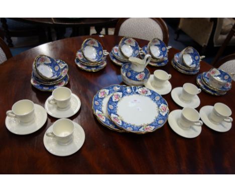 AN EDWARDIAN HAMMERSLEY &amp; CO TEA SET for twelve and a Wedgwood creamware coffee set