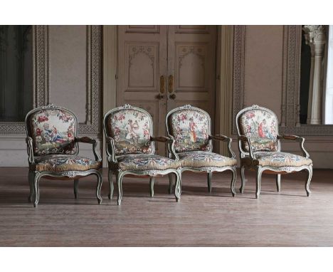 A set of four Louis XV Revival painted armchairs,mid-19th century, each with a grey and cream lined frame, tapestry-upholster