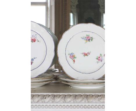A group of Sèvres and Sèvres-style porcelain plates,19th century, each with interlacing floral motifs in relief to the rim, p