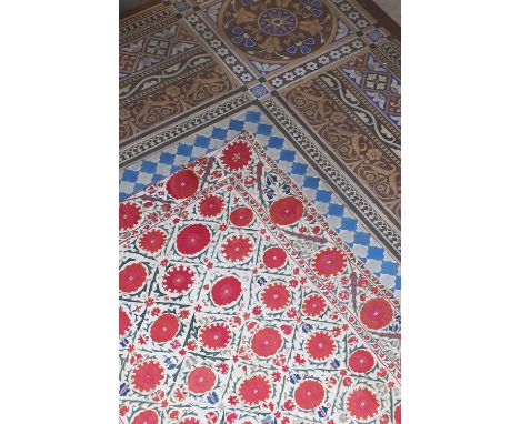 A large suzani panel,19th century, probably Bokhara, Uzbekistan, worked in multicoloured silk threads on a cotton ground, dec