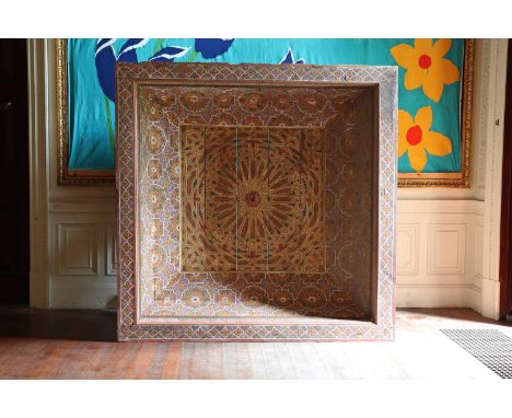 A painted pine canopy,Indian, the central square panel with a radiating pattern, fitted with a metal hook, the domed sides wi