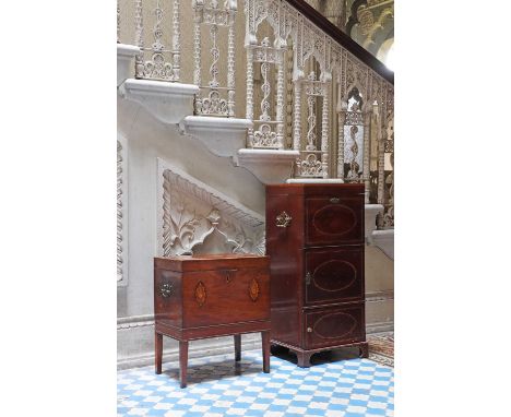 A George III inlaid mahogany cellaret,the top with chequer banding with inlaid spandrel and a central panel with a moth to th