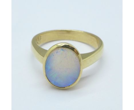 An 18ct gold and opal ring, 4.7g, M