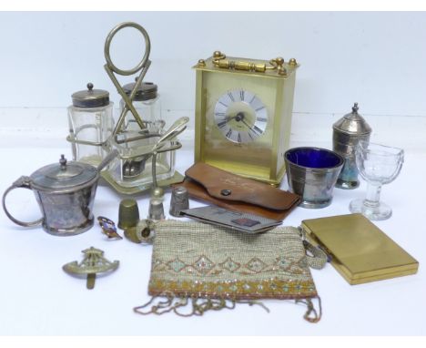 A 19th Century beaded bag, a condiment set, Robertsons badge, thimbles, clock, compact, cap badge, etc.