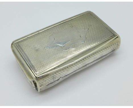 A white metal snuff box