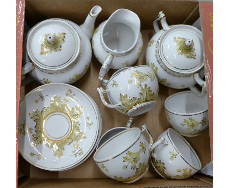 A Russian decorative china tea service with 22ct gold decoration