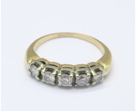 A 14ct gold and five stone ring, 3.1g, K