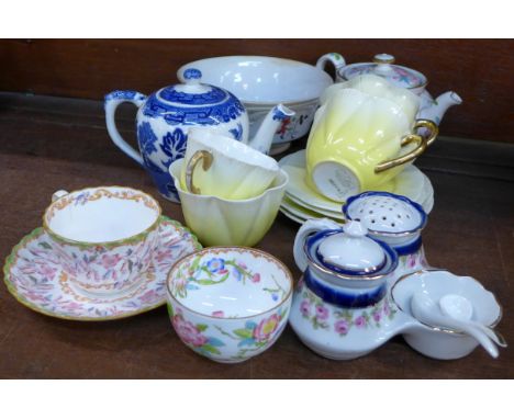 A Minton small teapot, matching tea bowl and a similar Minton cup and saucer, a collection of Shelley cups and saucers, one c