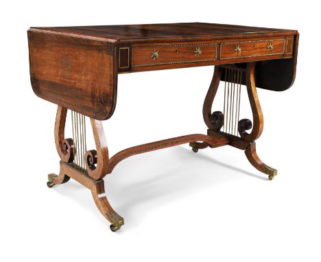 A Regency brass-inlaid rosewood sofa table, first quarter 19th century, the top with two D-shaped drop leaves with inlaid bra