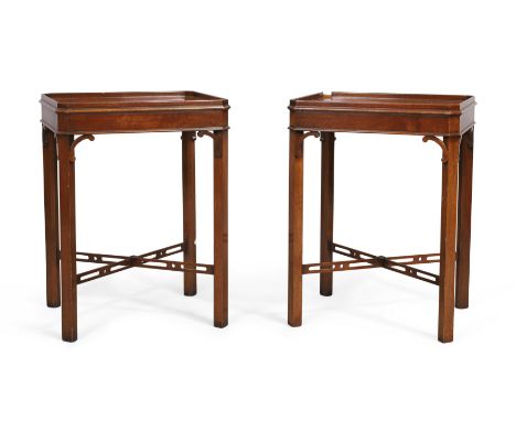 A pair of English mahogany occasional tables, by Arthur Brett of Norwich, of George III style, 20th century, the gallery tops