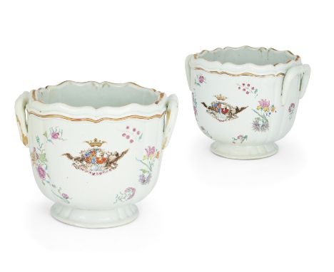 A pair of Chinese Export porcelain famille rose armorial jardinières, 18th century, with twin handles, decorated in bright en