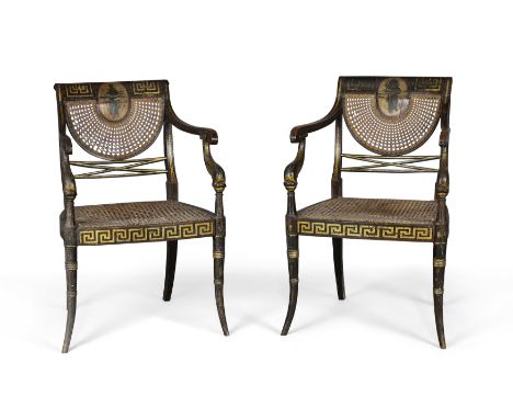 A pair of Regency simulated rosewood caned armchairs, in the manner of John Gee, first quarter 19th century, parcel gilt, the
