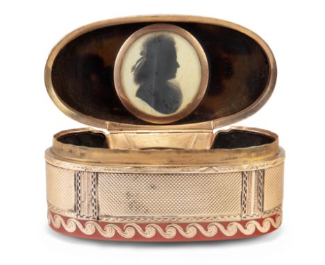 A French gold-mounted Indian-red lacquer snuff box, late 18th century, indistinct marks, of oval form, with Vitruvian scroll 