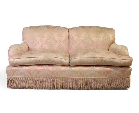 A Peter Dudgeon two seat sofa, last quarter 20th century, with salmon pink silk upholstery with floral design, rope trim, on 