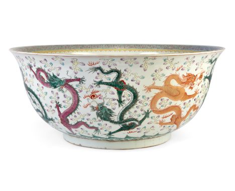 A very large modern Chinese porcelain famille rose bowl,&nbsp;apocryphal Guangxu six character mark to underside, the deep bo