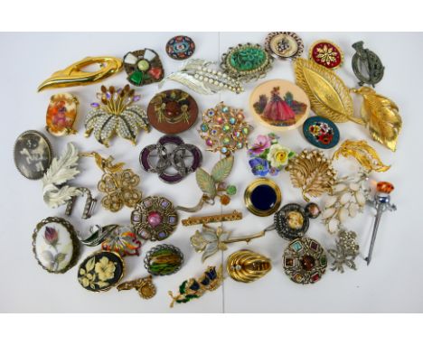 A collection of vintage brooches to include agate examples, micro mosaic and other. [W]