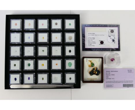 A collection of 25 gem stones individually boxed and contained in a case, a 4.77 cts Ruby with Certificate of Authenticity an