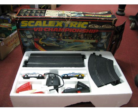 A 1980's Scalextric V8 Championship Set, with two Rover cars, boxed, playworn.