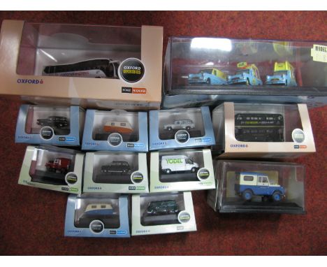 Twelve Cased Oxford Diecast Vehicles,  four 1:76 scale, eight 'N' gauge "Walls Ice Cream Anglia", trio noted, condition excel