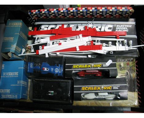 A 1960's Scalextric Set No 31, boxed, playworn missing one car, plus four 1970's Scalextric cars including C125 Porsche Turbo