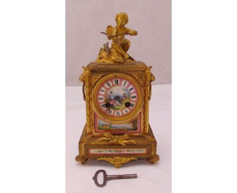 A French 19th century mantle clock, gilded metal and porcelain panels depicting courtly scenes, Roman numerals to circular di