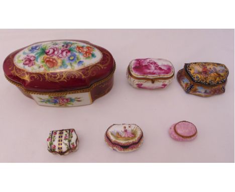 Six covered ceramic boxes of various form and size