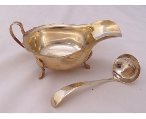 A hallmarked silver sauce boat and ladle, Sheffield 1959 by Edward Viner, approx total weight 136g