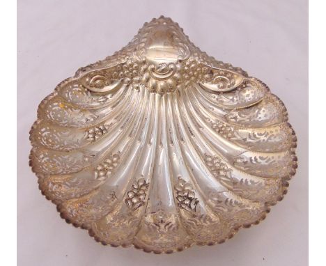 A hallmarked silver shell shaped dish on three ball feet, Sheffield 1903, approx total weight 307g