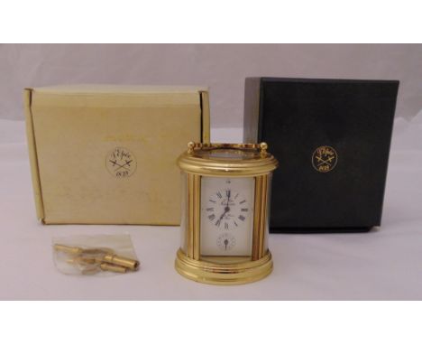 L'Epee miniature carriage clock with swing handle, white enamel dial and Roman numerals, to include key and original packagin