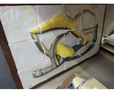 A mid/late 20th century ceramic tile wall plaque of stylised design